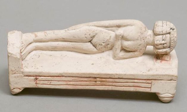Ancient Egyptian sleeping statue - social media