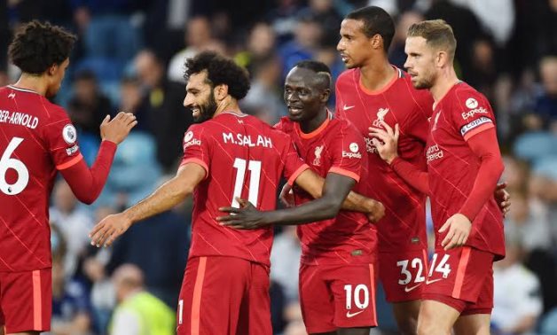 Liverpool's Sadio Mane celebrates scoring with Mohamed Salah and teammates REUTERS/Peter Powell