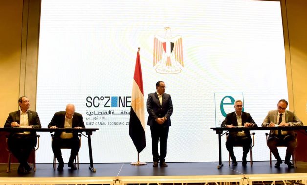Prime Minister Mostafa Madbouli attending the signing of a quadrilateral MoU on building an automotive factory in SCzone. June 14, 2022. Press Photo