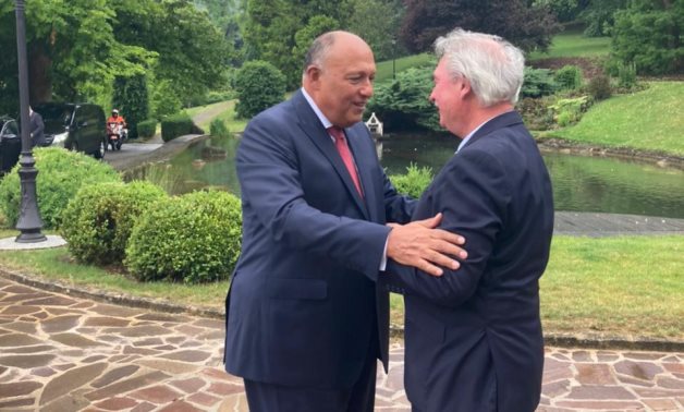 Minister of Foreign Affairs Sameh Shokry shaking hands with Luxembourgish counterpart Jean Asselborn during the former's visit to the European state. June 20, 2022. Press Photo