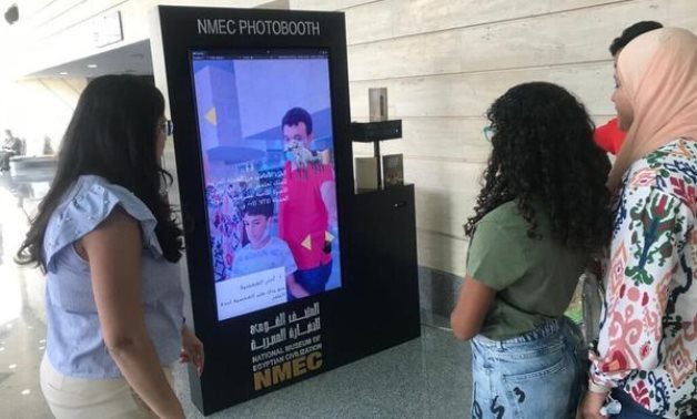 Visitors enjoy the photobooth in the NMEC during Eid al-Adha - Min. of Tourism & Antiquities 