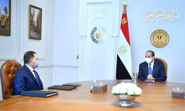 President Abdel Fatah al-Sisi and Minister of Interior Mahmoud Tawfik in a meeting on July 26, 2022. Press Photo