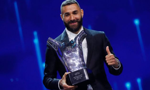 Real Madrid's Karim Benzema poses with the men's player of the year award REUTERS/Murad Sezer