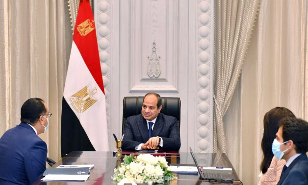 President Abdel Fattah El-Sisi met with Prime Minister, Dr. Mostafa Madbouly, and Minister of International Cooperation, Dr. Rania Al-Mashat- press photo