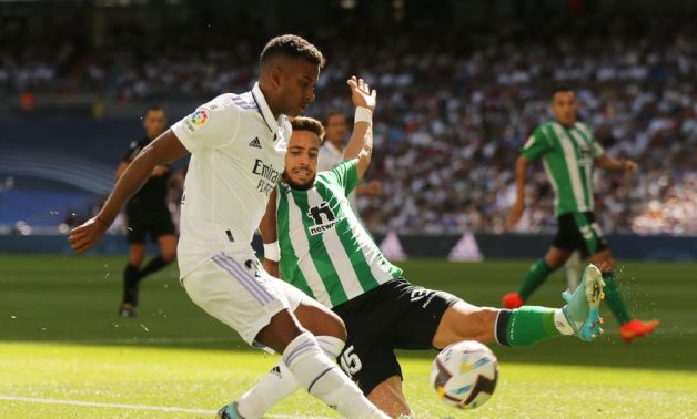 Real Madrid's Rodrygo in action with Real Betis' Alex Moreno REUTERS/Isabel Infantes