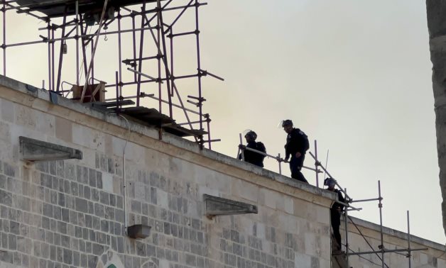Israeli forces take their positions on the roof of Al-Aqsa Mosque - WAFA