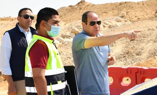 President Abdel Fattah El-Sisi inspected the construction work to develop a number of roads and axes in Greater Cairo- press photo