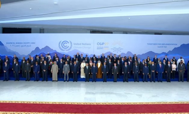 World Leaders pose for a photo at the opening session of the COP27