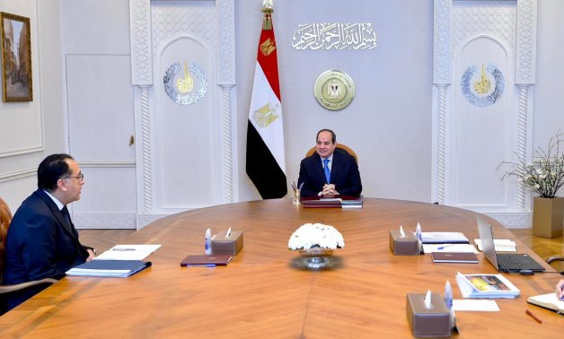 President Sisi in a meeting with Prime Minister, Dr. Moustafa Madbouly, and Minister of International Cooperation, Dr. Rania Al-Mashat- press photo