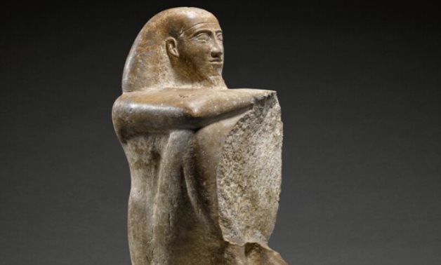 The ancient Egyptian statue - social media