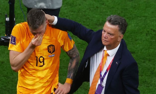 Netherlands coach Louis van Gaal and Wout Weghorst look dejected after the penalty shootout as Netherlands are eliminated from the World Cup REUTERS/Paul Childs