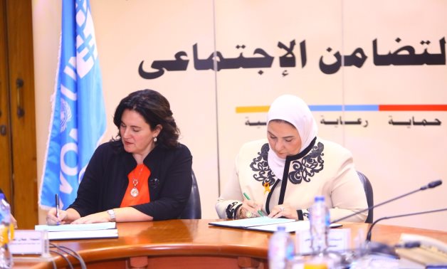 Minister of Social Solidarity Nevine al-Qabaj and Representative of UN Women Kristen Arab signing cooperation agreement on care economy. Cairo, Egypt, December 15, 2022. Press Photo