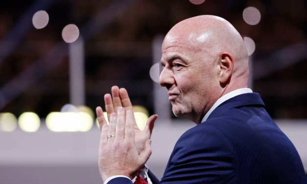  president Gianni Infantino claps during the awards ceremony after the 2022 World Cup final between Argentina and France at Lusail Stadium. Mandatory Credit: Yukihito Taguchi-USA TODAY Sports