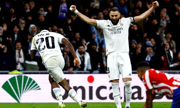 Real Madrid's Vinicius Junior celebrates scoring their third goal with Karim Benzema REUTERS/Susana Vera