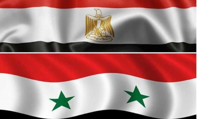 Egyptian and Syrian flags – Press Photo by Egyptian Presidency 