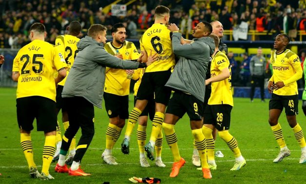  Borussia Dortmund players celebrate after the match REUTERS/Thilo Schmuelgen