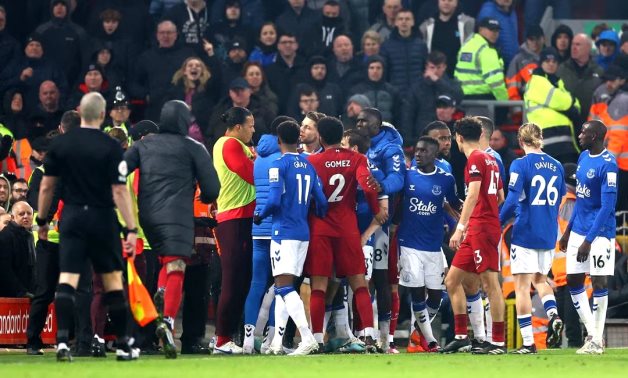 Liverpool's Virgil van Dijk and Joe Gomez clash with Everton's James Tarkowski, Amadou Onana and teammates REUTERS/Carl Recine /File Photo