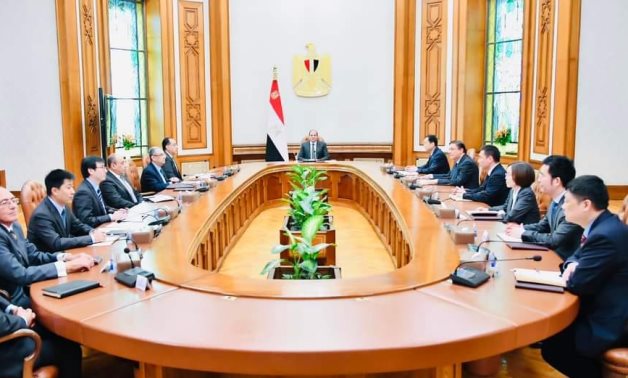 Egyptian President Abdel Fattah El-Sisi and a group of Egyptian officials meet with representatives of the China International Energy Group (CIEG)- press photo