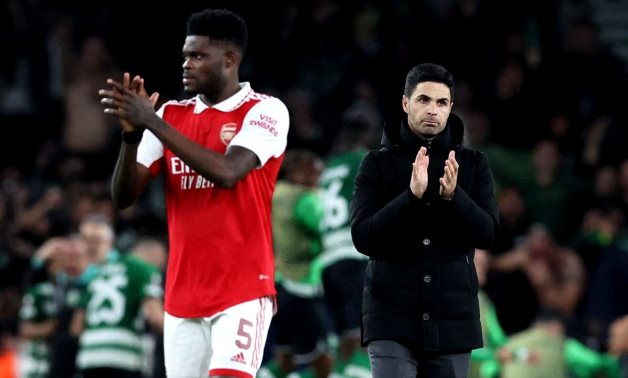 Arsenal's Thomas Partey and manager Mikel Arteta look dejected after losing the penalty shootout REUTERS/David Klein