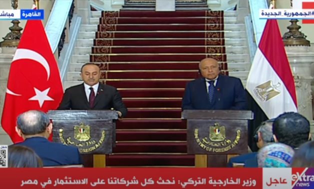 Turkish Foreign Minister Mevlut Cavusoglu (L) and Egyptian Foreign Minister Sameh Shoukry (R) during press conference in Cairo - TV Screenshot