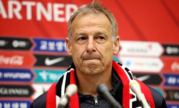 South Korean national soccer team's new head coach Juergen Klinsmann speaks upon his arrival at Incheon International Airport in Incheon, South Korea, March 8, 2023. REUTERS/Kim Soo-hyeon