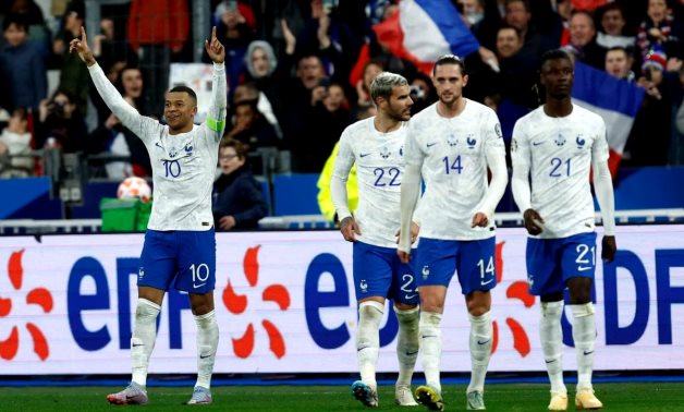France's Kylian Mbappe celebrates scoring their fourth goal with Theo Hernandez, Adrien Rabiot and Eduardo Camavinga REUTERS/Gonzalo Fuentes