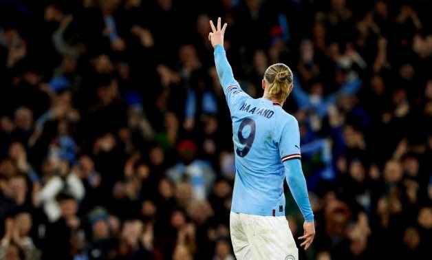 Manchester City's Erling Braut Haaland celebrates scoring their third goal and his hat-trick Action Images via Reuters/Jason Cairnduff