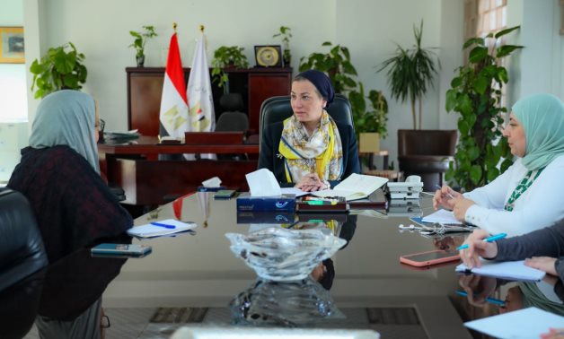 Egyptian Minister of Environment meets with Manal Saleh, the Chief Executive Officer (ECO) at Egyptian Clothing Bank- press photo