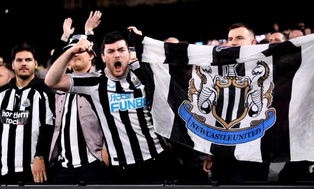 Newcastle United fans inside the stadium before the match REUTERS/Tony Obrien