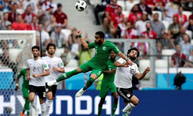 Saudi Arabia's Mohammed Al-Breik in action with Egypt's Mohamed Salah REUTERS/Ueslei Marcelino