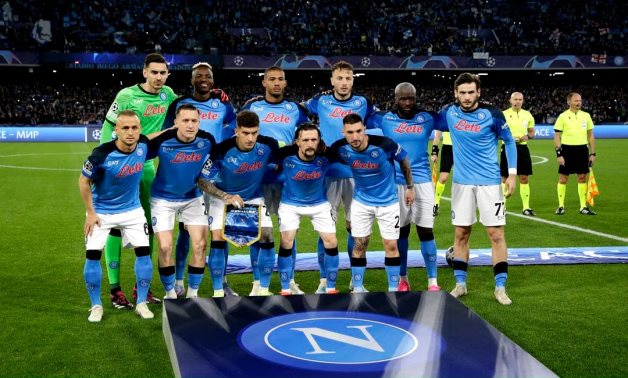 Napoli players pose for a team group photo before the match REUTERS/Ciro De Luca
