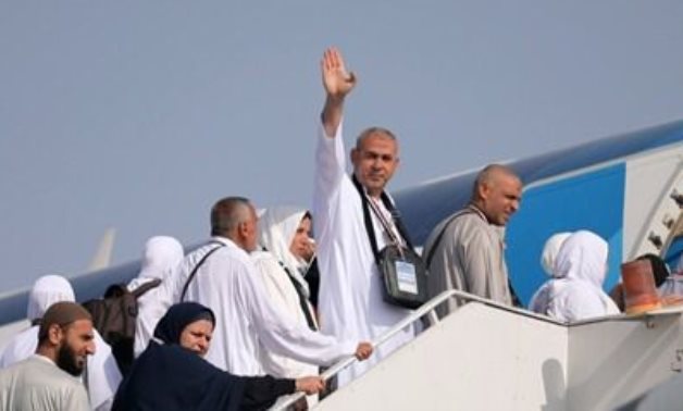 The first group of Egyptian pilgrims of this year, 2023, boarding the plane to Saudi Arabia- press photo