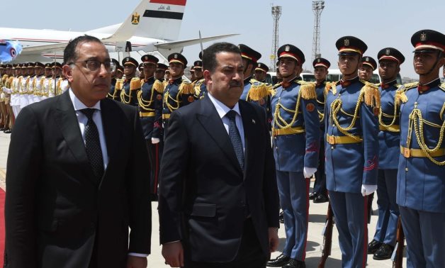 Egypt's PM Mostafa Madbouli receives his Iraqi counterpart, Shiaa Al-Sudani, at Cairo International Airport - Cabinet