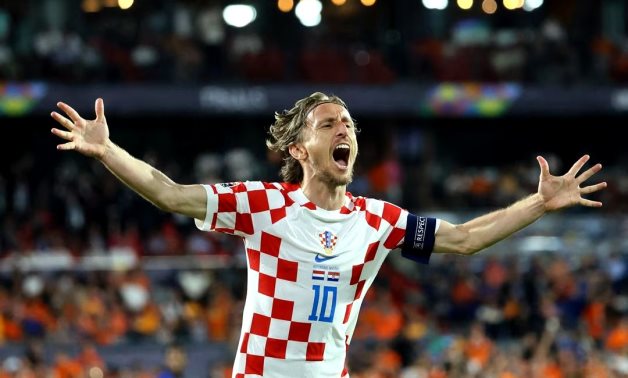 Croatia's Luka Modric celebrates scoring their fourth goal REUTERS/Wolfgang Rattay