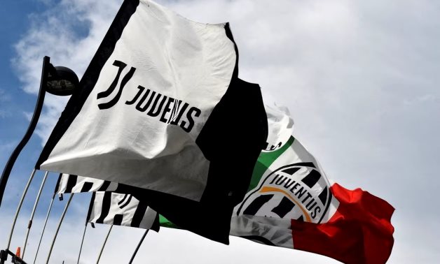 General view of Juventus flags seen outside the stadium before the match REUTERS/Massimo Pinca/File Photo