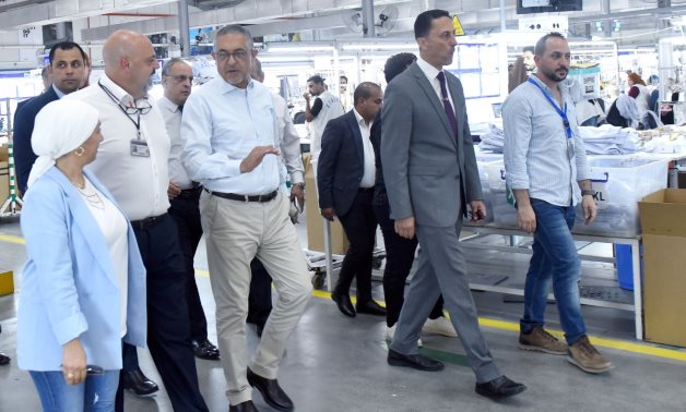 : Chairman of the General Authority for Investment and Free Zones (GAFI) Hossam Heiba at a factory in Ismailiyah Free Zone. August 2023. Press Photo 