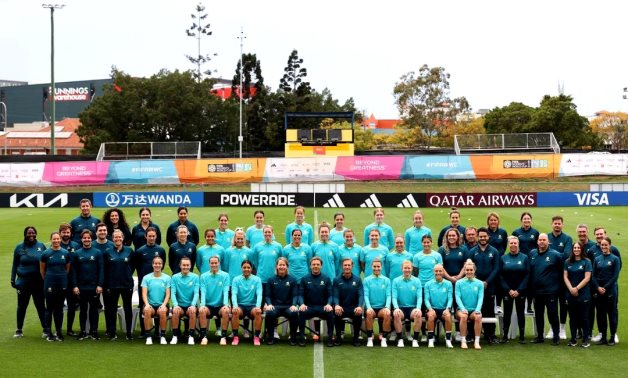 Australia coach Tony Gustavsson poses with players and coaching staff for a team group photo before training REUTERS/Amanda Perobelli/ File Photo