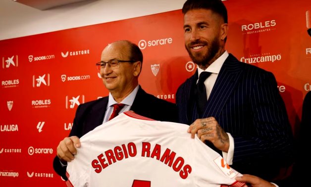 Sevilla's Sergio Ramos poses with president Jose Castro during the presentation REUTERS/Marcelo Del Pozo