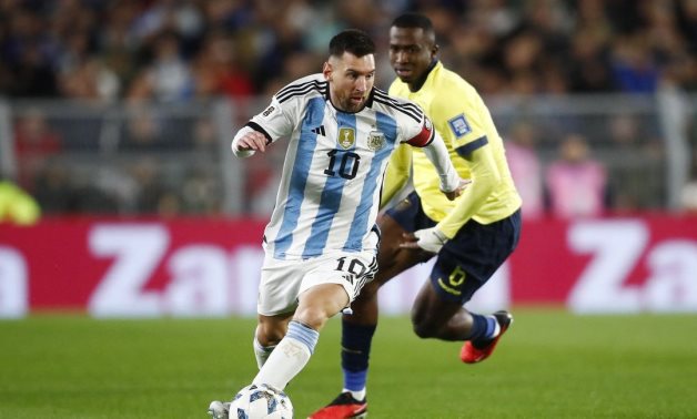 Argentina's Lionel Messi in action with Ecuador's William Pacho REUTERS/Agustin Marcarian