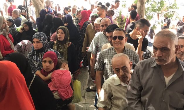 Egyptians flock to the recorders of deeds to document their endorsement for President Sisi to run for another 6-year term in the presidency- Youm7/Abelrhaman Sayyed