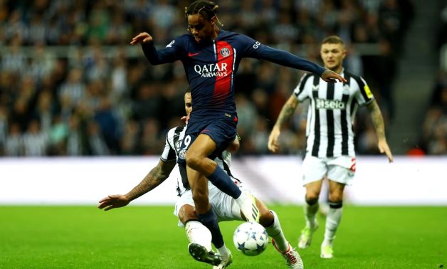 Paris St Germain's Bradley Barcola in action with Newcastle United's Jamaal Lascelles Action Images via Reuters/Lee Smith 