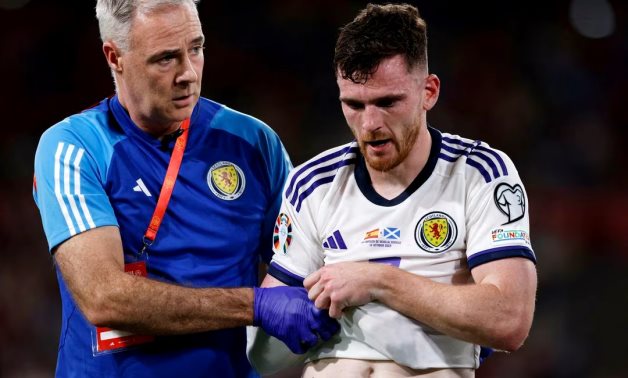 Scotland's Andy Robertson walks off the pitch after sustaining an injury REUTERS/Marcelo Del Pozo/File Photo