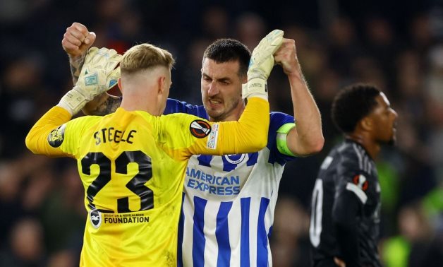 Brighton & Hove Albion's Jason Steele and Lewis Dunk celebrate after the match Action Images via Reuters/Matthew Childs