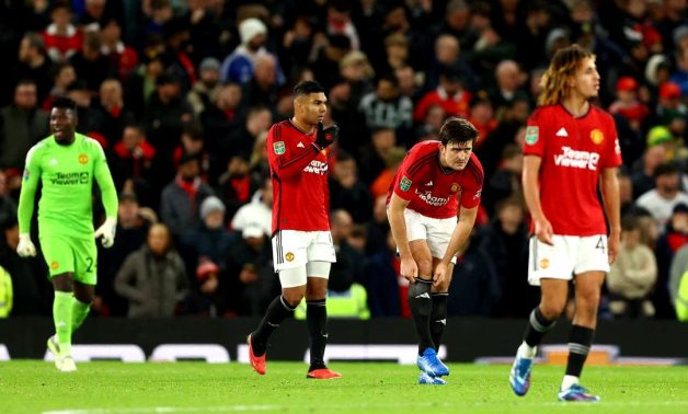 Manchester United's Harry Maguire, Casemiro and teammates look dejected after conceding their second goal, scored by Newcastle United's Lewis Hall REUTERS/Molly Darlington/File Photo