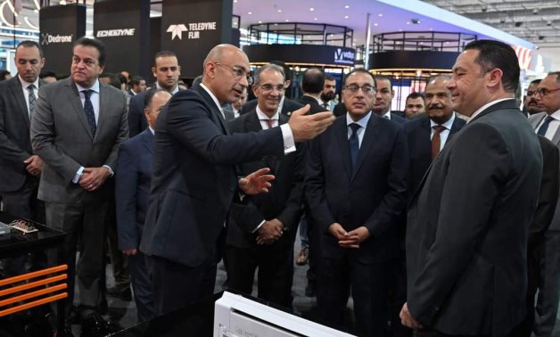 Eng.Yasser Shaker, CEO of Orange Egypt, showcasing the latest Orange services to H.E. Prime Minister Dr. Mostafa Madbouly