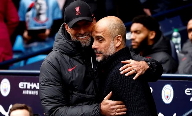 Manchester City manager Pep Guardiola with Liverpool manager Juergen Klopp before the match Action Images via Reuters/Jason Cairnduff/File Photo 