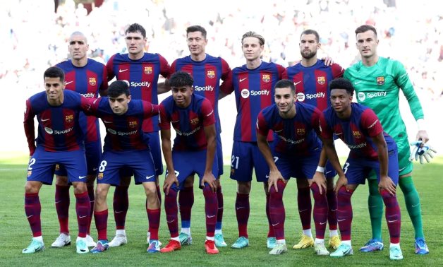 FC Barcelona players pose for a team group photo before the match REUTERS/Isabel Infantes/File Photo