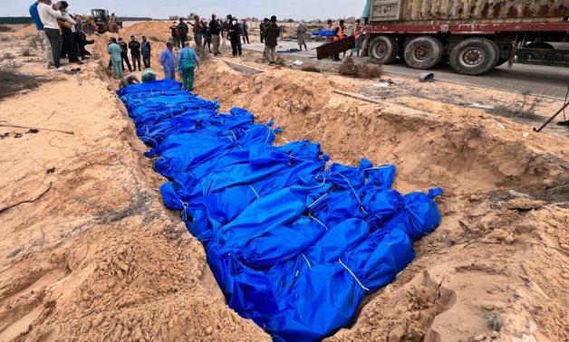 A mass grave dug for 80 bodies let unburied for several days after being killed by Israeli forces in Gaza