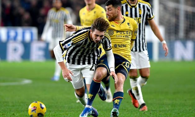 Juventus' Fabio Miretti in action with Genoa's Stefano Sabelli REUTERS/Massimo Pinca