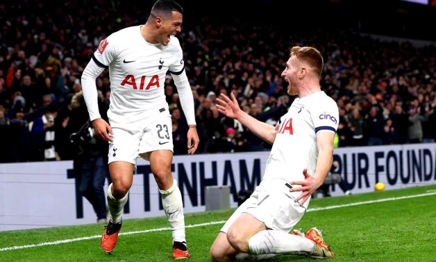 Tottenham Hotspur's Pedro Porro celebrates scoring their first goal with Dejan Kulusevski Action Images via Reuters/Paul Childs